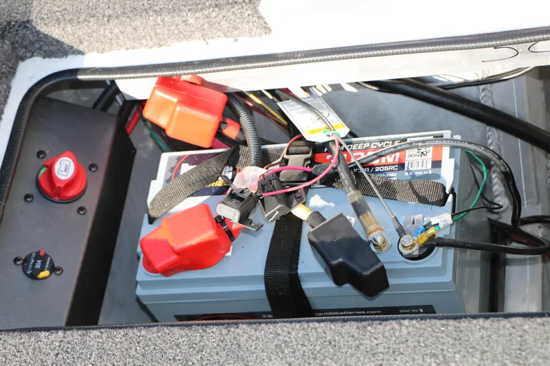 Slide: The Image of Battery compartment of 2025 Vexus AVX 1985s boat with wiring and connections. - 33