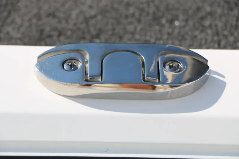 Slide: The Image of Chrome boat cleat on 2025 Vexus AVX 1985s, mounted on white surface. - 37