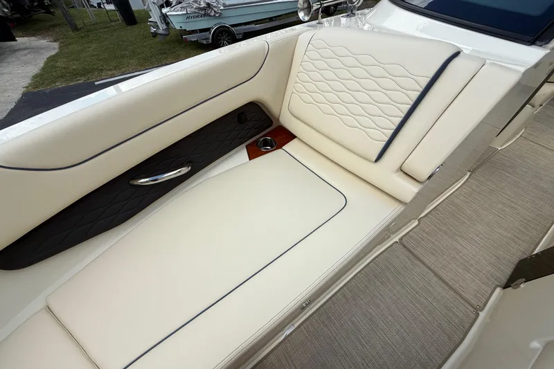 Slide: The Image of Luxurious interior of 2026 Chris-Craft Sportster 28 boat with elegant seating design. - 12