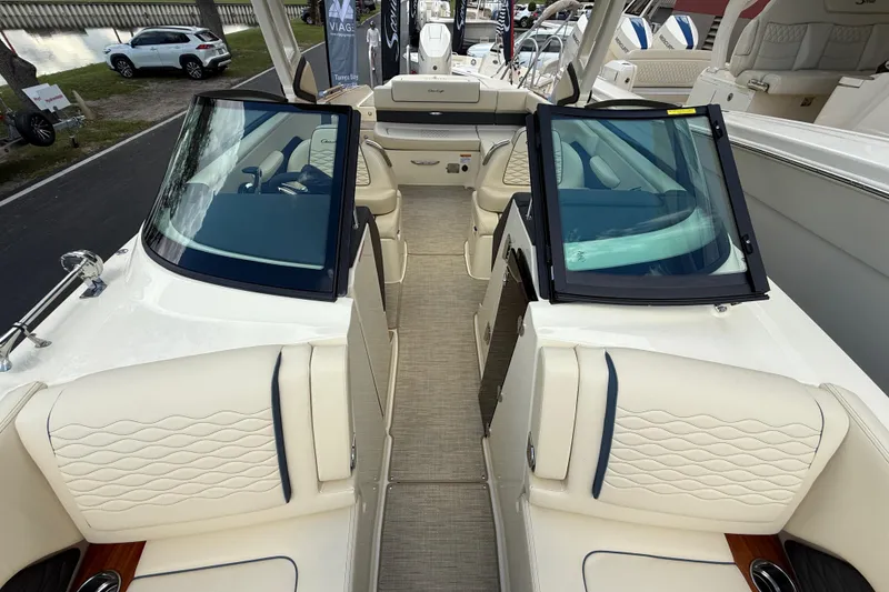 Slide: The Image of 2026 Chris-Craft Sportster 28 boat interior with luxurious seating and modern design. - 13