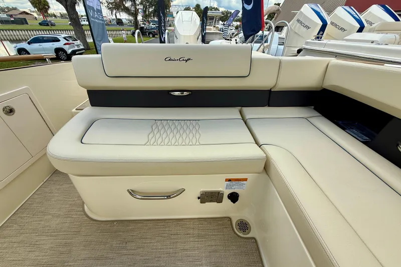 Slide: The Image of 2026 Chris-Craft Sportster 28 boat interior with luxurious seating and elegant design. - 56