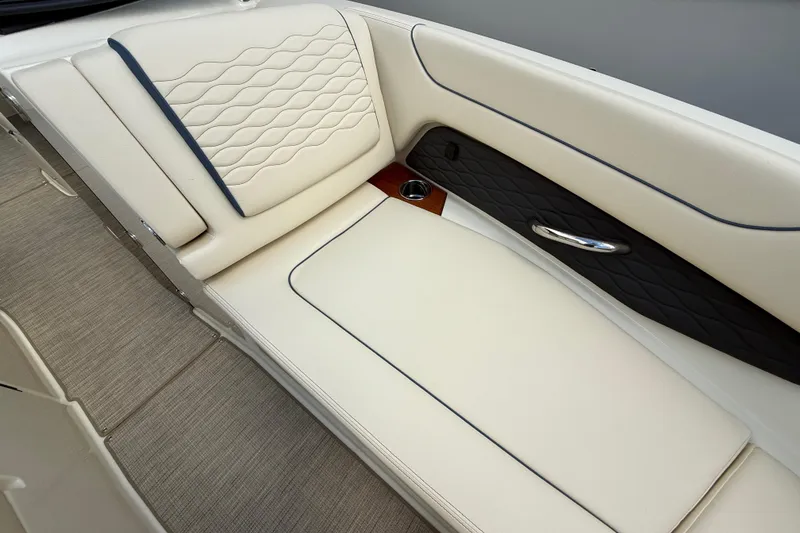 Slide: The Image of Luxurious seating on 2026 Chris-Craft Sportster 28 boat, featuring elegant upholstery and sleek design. - 62