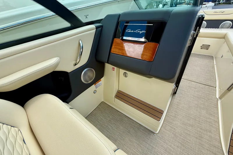 Slide: The Image of 2026 Chris-Craft Sportster 28 interior with luxurious seating and elegant design details. - 8