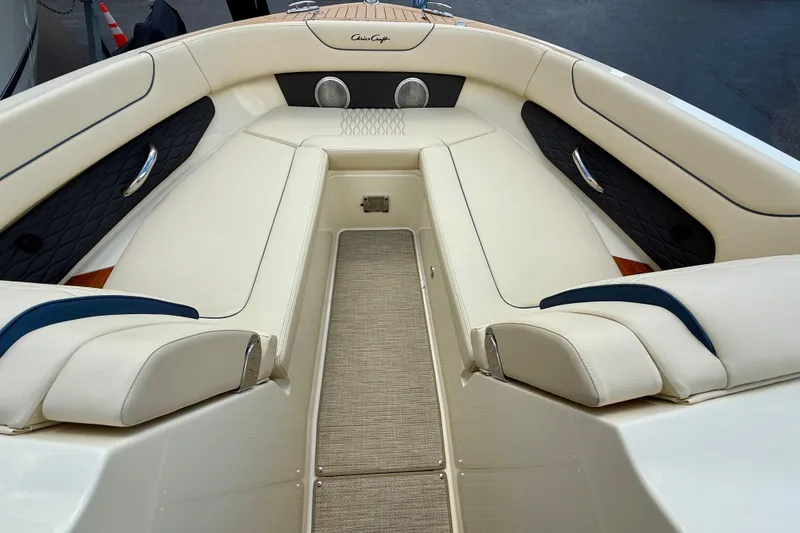 Slide: The Image of 2026 Chris-Craft Sportster 28 boat interior with luxurious seating and elegant design. - 9