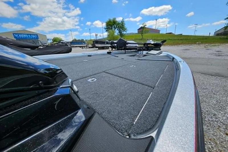 Slide: The Image of 2025 Ranger Z518 Cup-Equipped boat deck under blue sky at Norris Lake. - 10