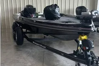 Slide: The Image of 2025 Ranger Z518 Cup-Equipped boat on trailer in storage facility. - 7
