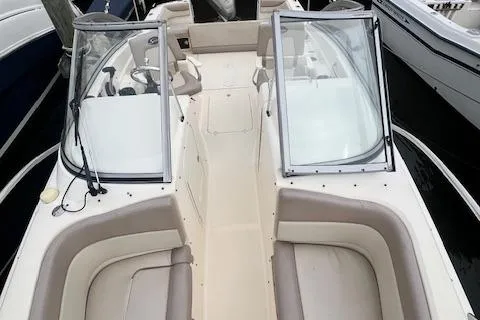 Slide: The Image of 2008 Scout 242 Dorado boat with open cockpit and seating, docked at marina. - 19