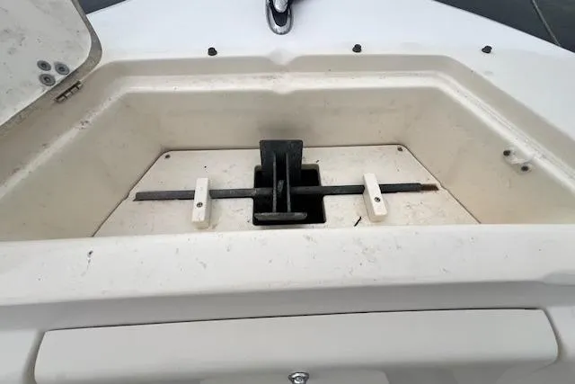 Slide: The Image of Anchor storage compartment on a 2008 Scout 242 Dorado boat. - 20