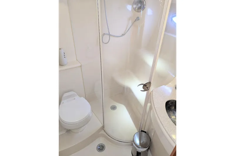 Slide: The Image of Bathroom interior of 2004 Meridian 411 yacht with shower, toilet, and sink. - 24