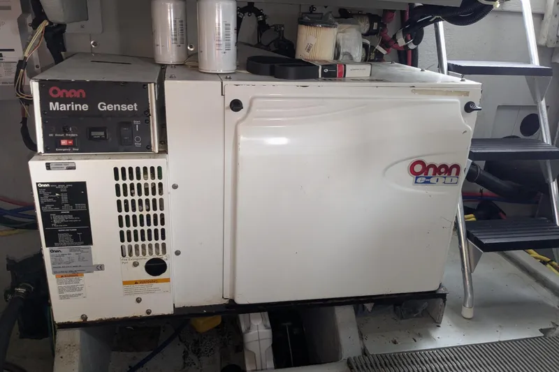 Slide: The Image of Onan marine generator in a 2004 Meridian 411 yacht engine room. - 29