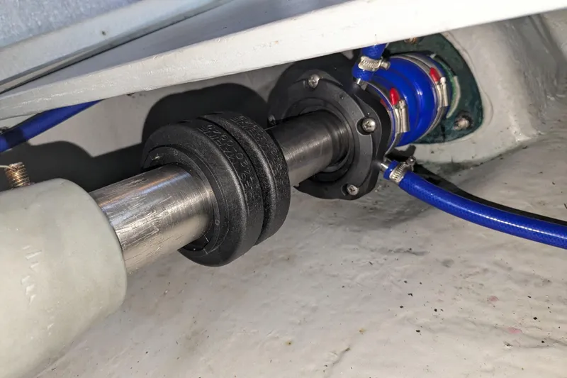 Slide: The Image of Close-up of a 2004 Meridian 411 boat shaft and coupling system. - 31