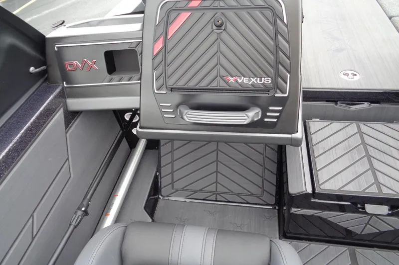 Slide: The Image of 2026 Vexus DVX22S boat interior with sleek, modern design and storage compartments. - 14