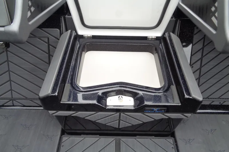 Slide: The Image of 2026 Vexus DVX22S boat storage compartment with open lid, showcasing interior design. - 18