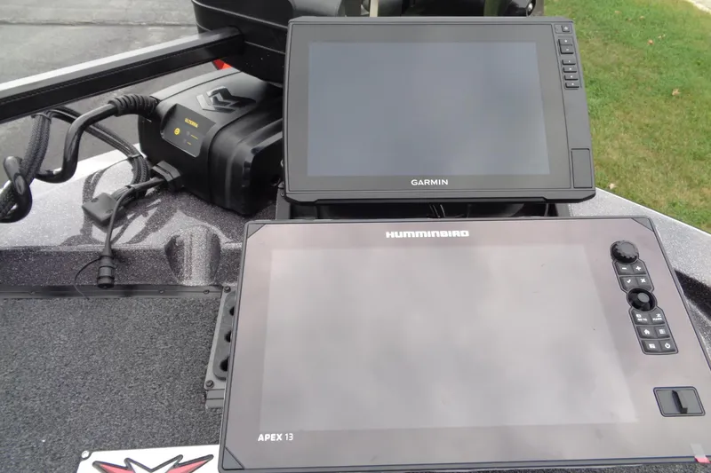 Slide: The Image of 2026 Vexus DVX22S boat with Garmin and Humminbird navigation displays. - 21