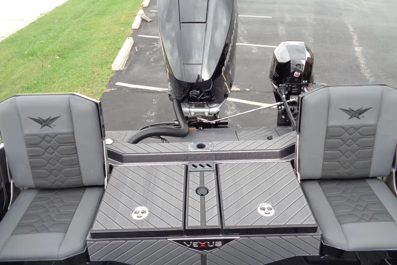 Slide: The Image of 2026 Vexus DVX22S boat interior with dual seats and sleek design. - 8
