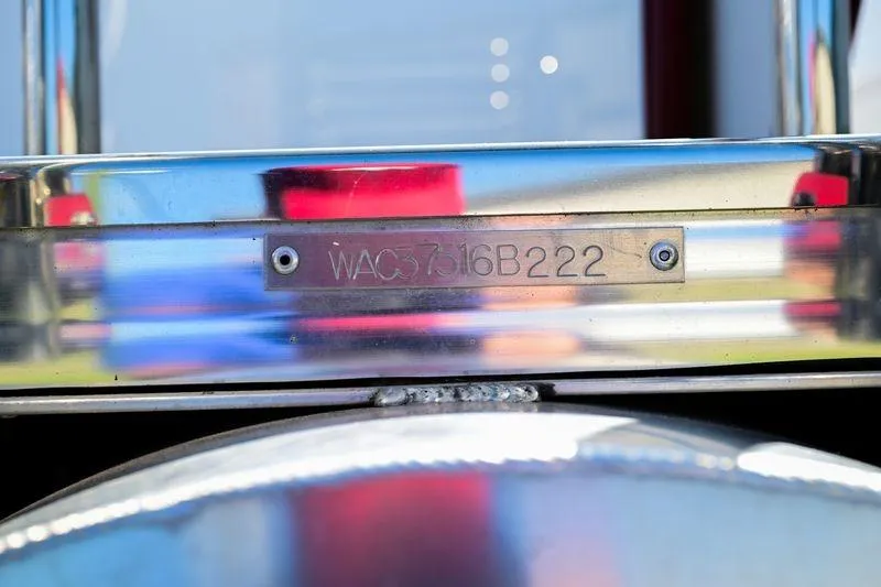 Slide: The Image of 2022 Aloha Pontoon Mahalo 23, close-up of identification plate with serial number. - 10