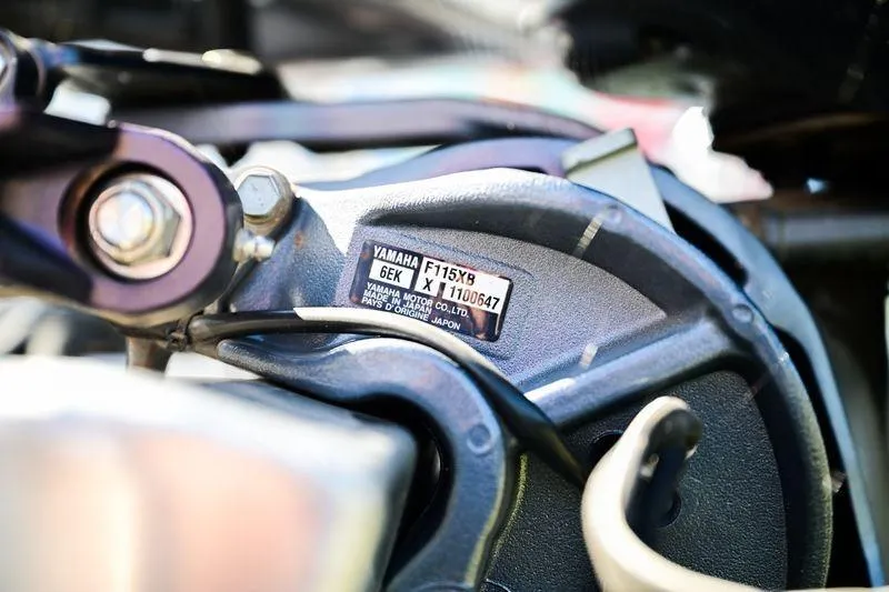 Slide: The Image of Close-up of Yamaha F115XB engine part on 2022 Aloha Pontoon Mahalo 23. - 9