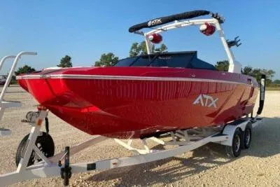 Slide: The Image of 2026 ATX Surf Boats 22 Type-S, red, on trailer, ready for water adventures. - 2