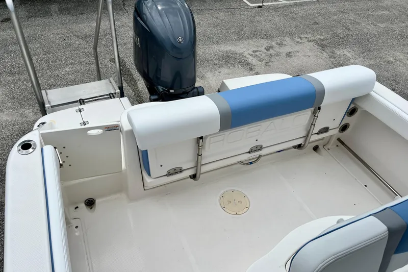 Slide: The Image of 2024 Robalo R222 Center Console boat interior with Yamaha outboard motor. - 7