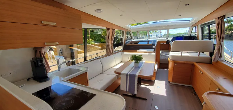 Slide: The Image of Luxurious interior of 2023 Greenline 40 yacht with modern furnishings and panoramic windows. - 32