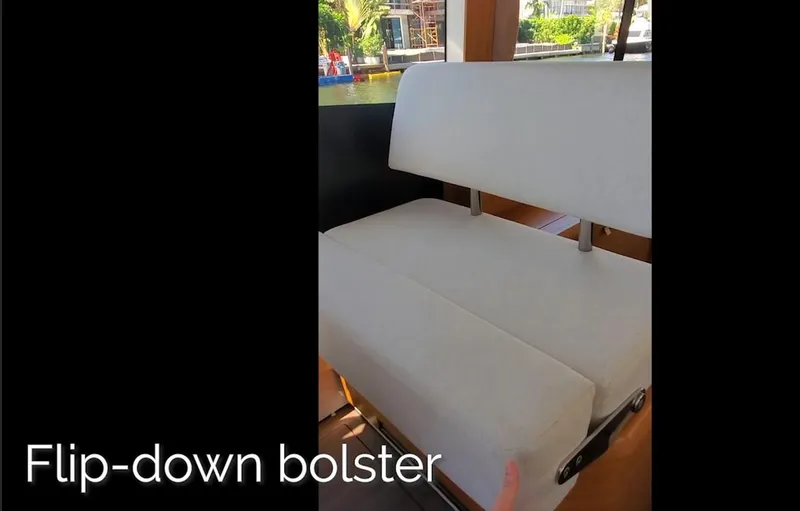 Slide: The Image of Flip-down bolster seat on 2023 Greenline 40 yacht, showcasing comfort and functionality. - 47