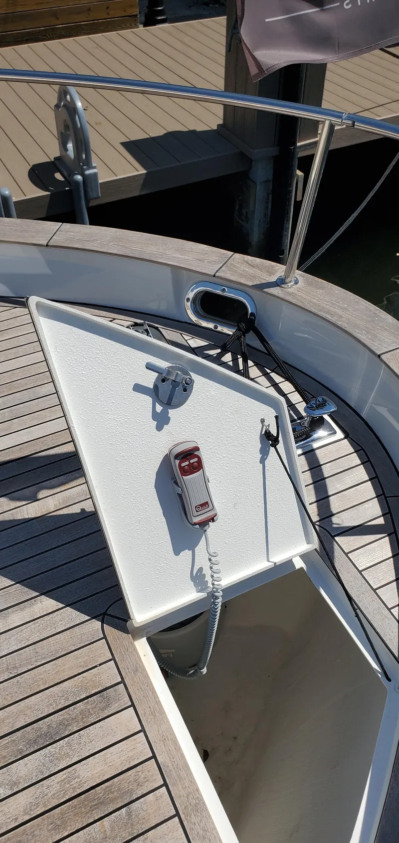 Slide: The Image of Deck of 2023 Greenline 40 yacht with open hatch and control panel. - 8