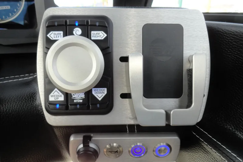 Slide: The Image of Control panel of 2021 Malibu Wakesetter 23 LSV boat with surf and wedge adjustments. - 12