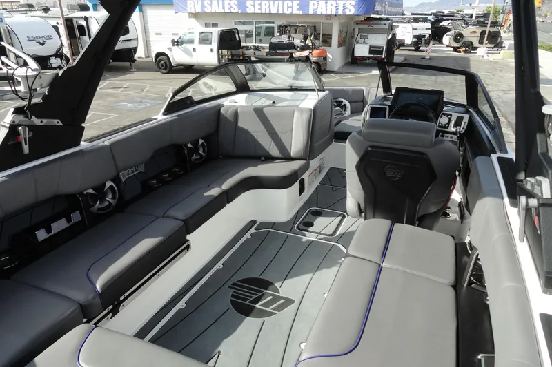 Slide: The Image of 2021 Malibu Wakesetter 23 LSV interior with sleek seating and modern dashboard. - 17