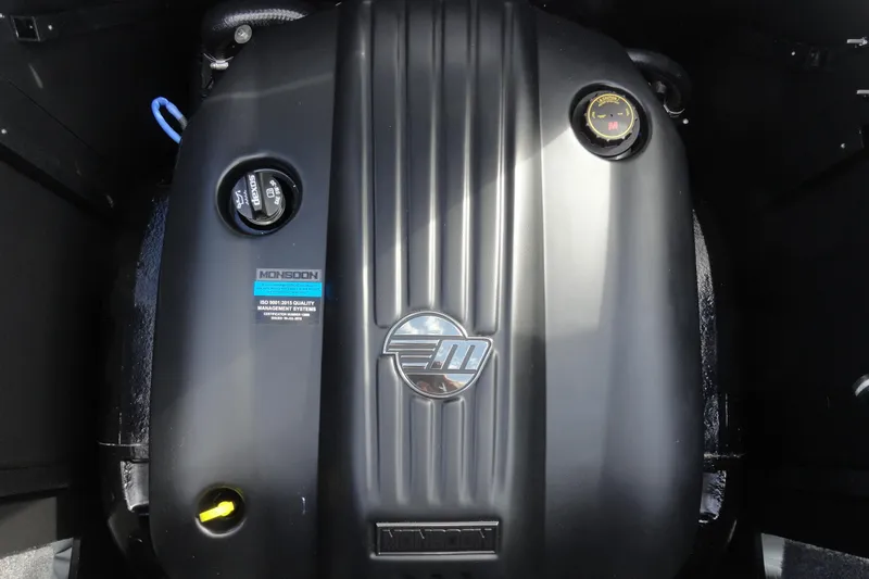 Slide: The Image of 2021 Malibu Wakesetter 23 LSV engine, featuring Monsoon branding and sleek black design. - 25