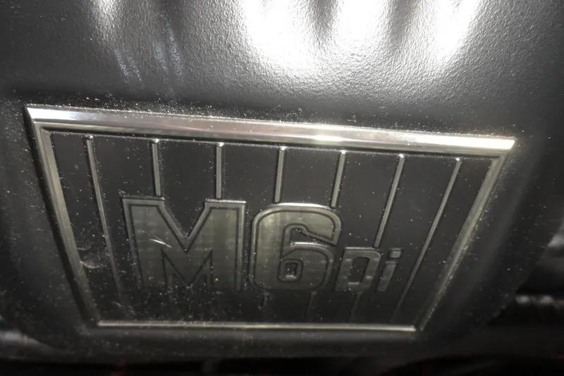 Slide: The Image of M6di engine badge on 2021 Malibu Wakesetter 23 LSV boat. - 26