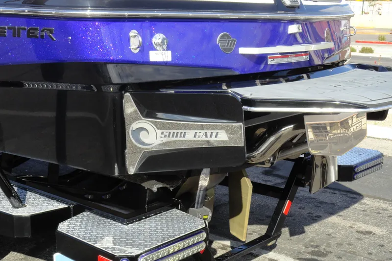 Slide: The Image of 2021 Malibu Wakesetter 23 LSV boat with Surf Gate technology, rear view. - 6