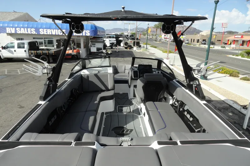 Slide: The Image of 2021 Malibu Wakesetter 23 LSV boat interior with sleek seating and modern design. - 8