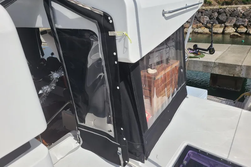 Slide: The Image of Lagoon 52 F yacht interior with sunset view, 2017 model, docked at marina. - 21