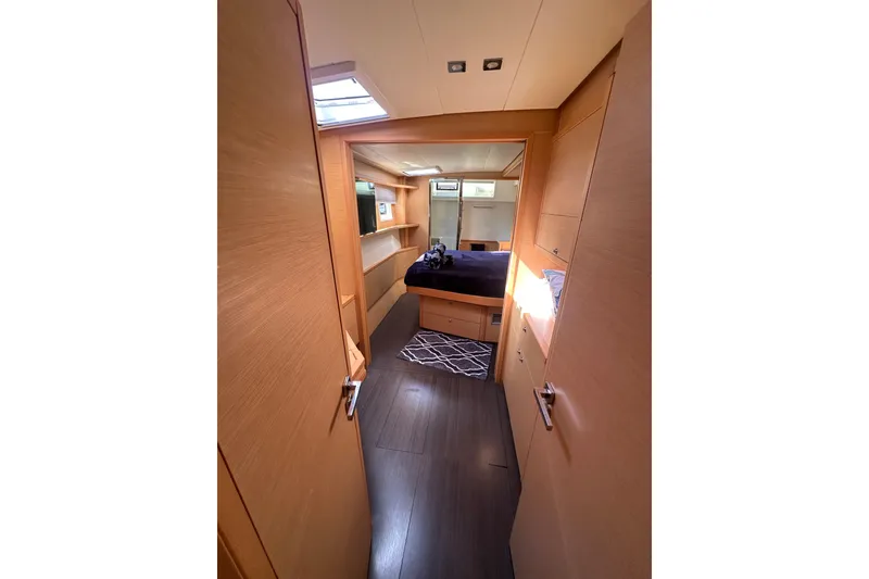 Slide: The Image of Luxurious bathroom in 2017 Lagoon 52 F yacht with modern shower and wooden shelving. - 37
