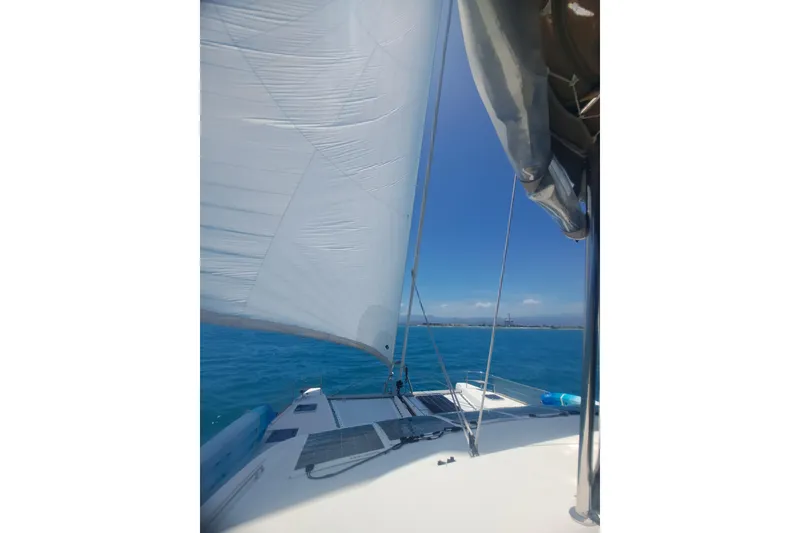 Slide: The Image of 2017 Lagoon 52 F catamaran deck with anchor chain and winch. - 6