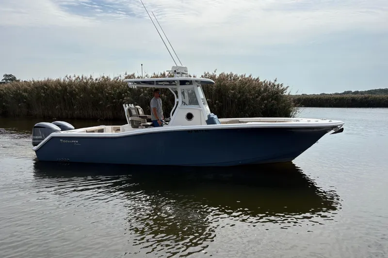 The Image of 2018 Tidewater 280 CC Adventure boat displayed at a marina. - 0