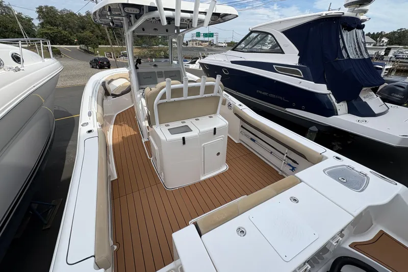 Slide: The Image of 2018 Tidewater 280 CC Adventure with twin Yamaha 250 outboard engines. - 15