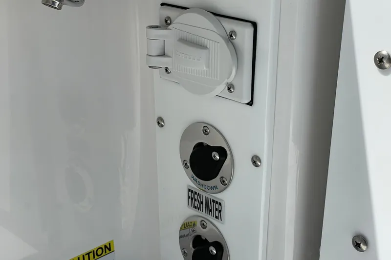 Slide: The Image of 2026 Everglades 285 Center Console boat, fresh water and washdown ports. - 16