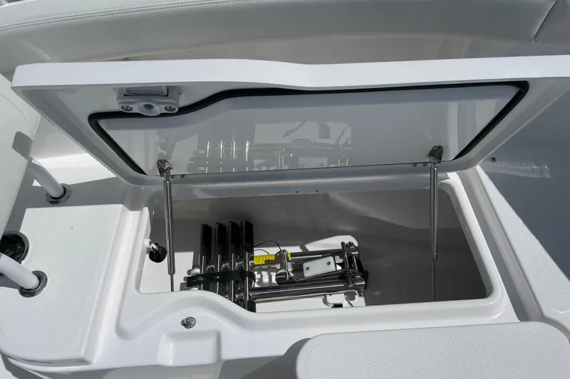 Slide: The Image of Open storage compartment on 2026 Everglades 285 Center Console boat. - 6