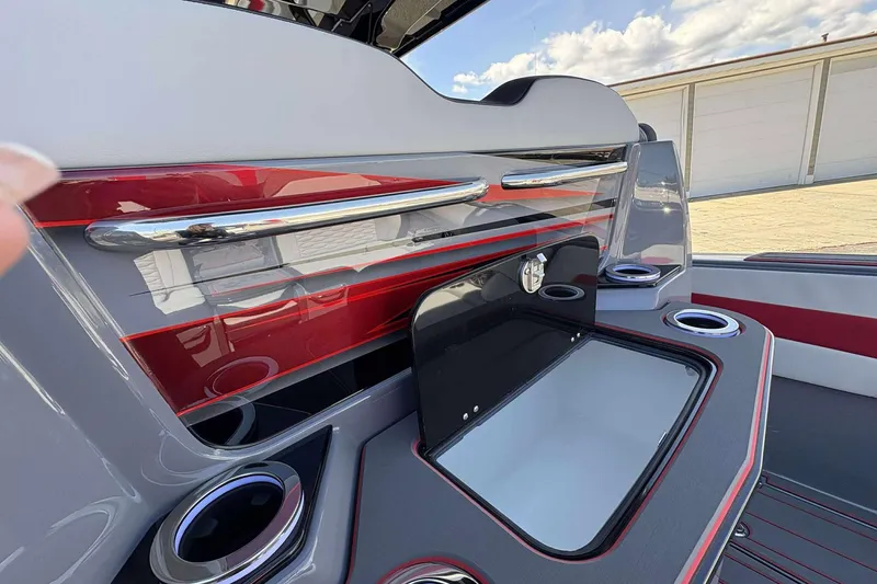 Slide: The Image of 2026 Sunsation 32 CCX boat interior with sleek design and cup holders. - 12