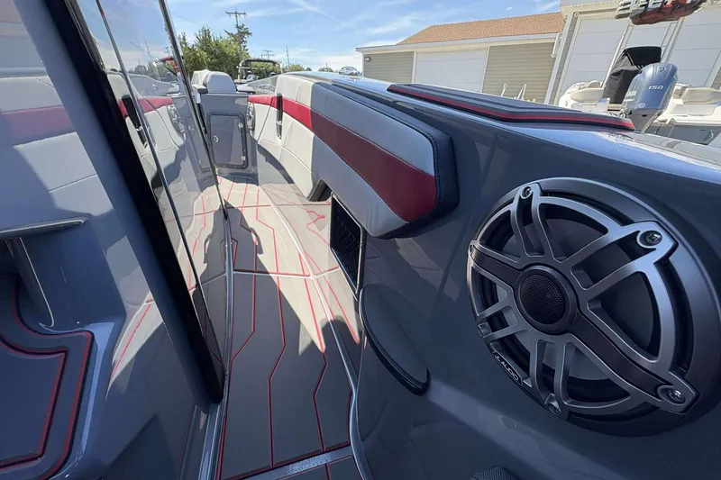 Slide: The Image of 2026 Sunsation 32 CCX boat interior with sleek design and powerful speaker system. - 16