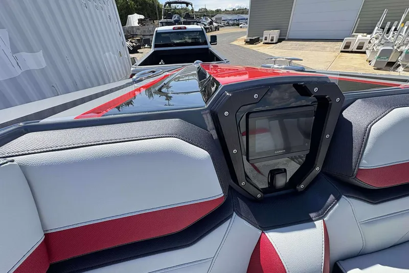 Slide: The Image of 2026 Sunsation 32 CCX boat interior with sleek design and advanced Garmin navigation system. - 19