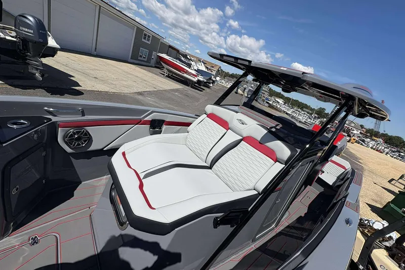 Slide: The Image of 2026 Sunsation 32 CCX boat interior with modern seating and sleek design. - 21
