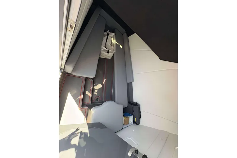 Slide: The Image of 2026 Sunsation 32 CCX cabin interior with sleek seating and modern design elements. - 24