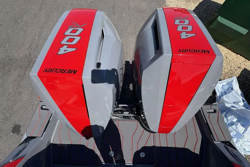 Slide: The Image of Twin Mercury 400 outboard engines on 2026 Sunsation 32 CCX boat. - 32