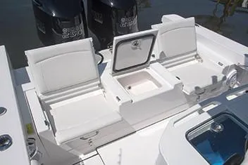 Slide: The Image of Manufacturer Provided Image: 2020 Everglades 273 Center Console boat with open storage compartment and twin outboard engines. - 16