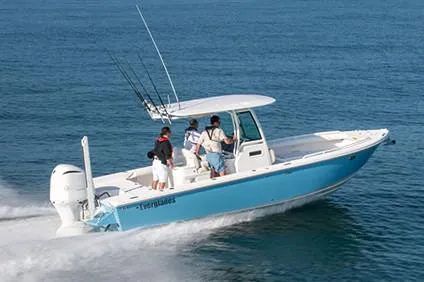 Slide: The Image of Manufacturer Provided Image: 2020 Everglades 273 Center Console boat cruising on open water. - 2