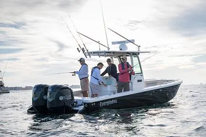 Slide: The Image of Manufacturer Provided Image: 2020 Everglades 273 Center Console boat with people fishing on open water. - 5