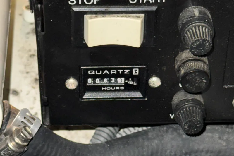 Slide: The Image of Hour meter on 2004 Sea Ray 320 Sundancer showing 631 hours. - 50