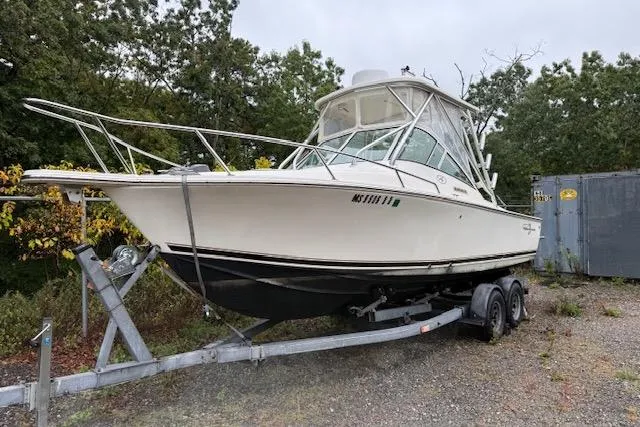 The Image of 2005 Albemarle 248 Express Fisherman boat on trailer, parked outdoors. - 0